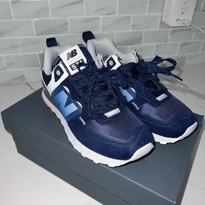 Navy new balance sneakers